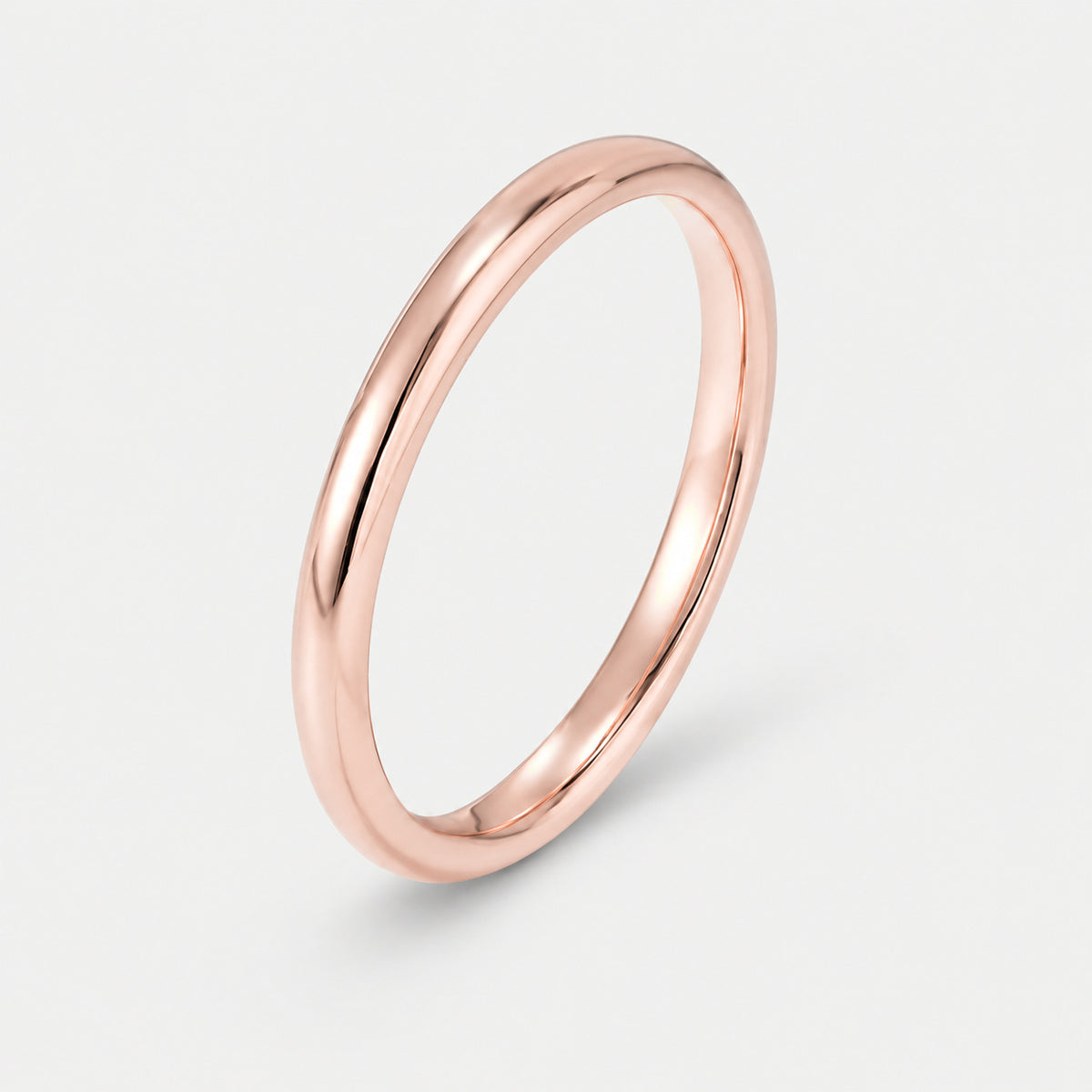 Bague Épure, anneau fin en acier inoxydable, finition dorée rose — vue studio