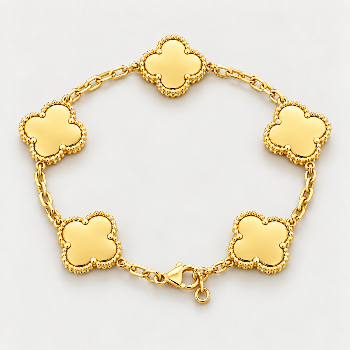 Bracelet Éclipse cinq motifs en acier inoxydable, finition tout doré — vue studio
