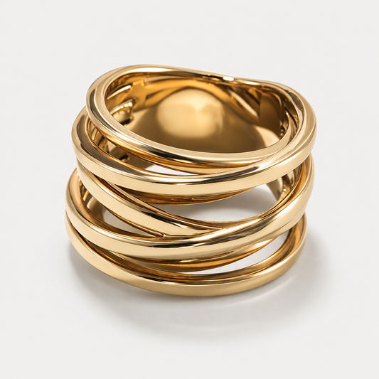 Bague Volute multi-rangs en acier inoxydable, finition dorée — vue studio
