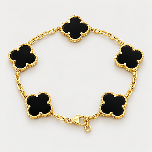 Bracelet Éclipse cinq motifs en acier inoxydable, finition dorée — vue studio