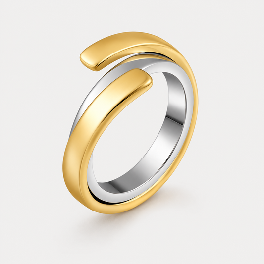 Bague Volute ouverte, deux métaux en acier inoxydable bicolore, finitions dorée et argentée — vue studio