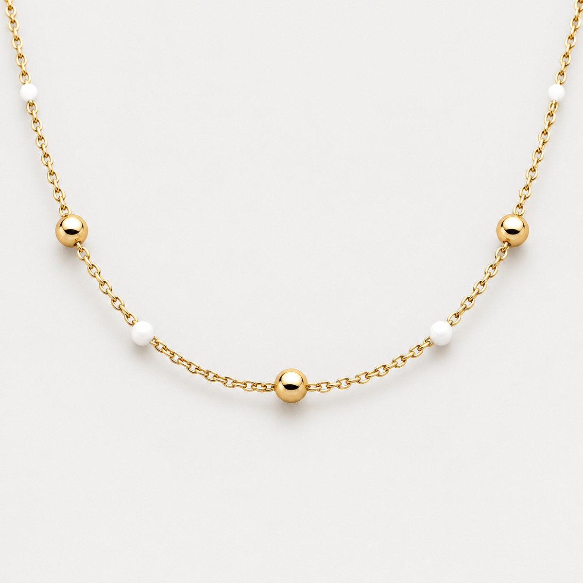 Collier Éclat billes en acier inoxydable, finition dorée — vue studio